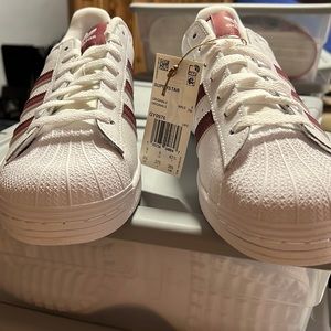 Selling brand new condition Mens adidas 9 1/2